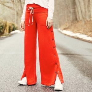 FREE PEOPLE FP MOVEMENT VIOLA SNAP PANTS IN RED